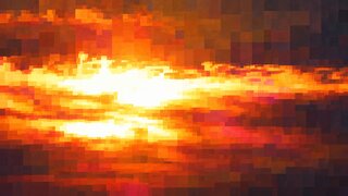 The same sunset as a coarse mosaic of square tiles.